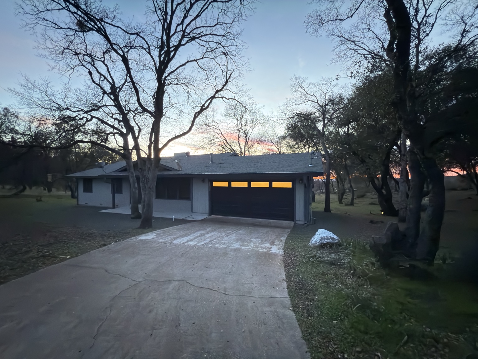 Home and driveway at dusk