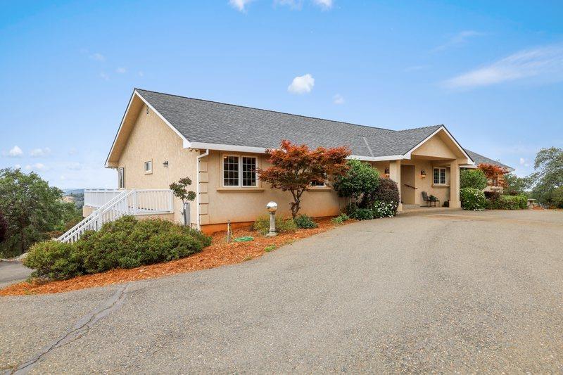 Home exterior with a landscaped approach